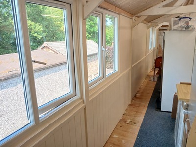 Walls reboarded and given fresh coat of paint