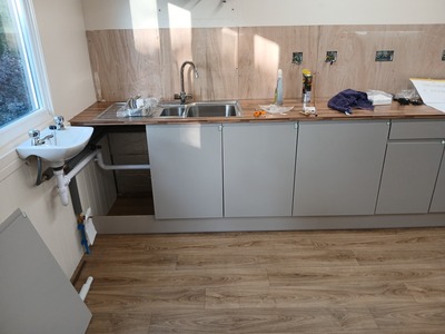 Sinks fitted and plumbed in